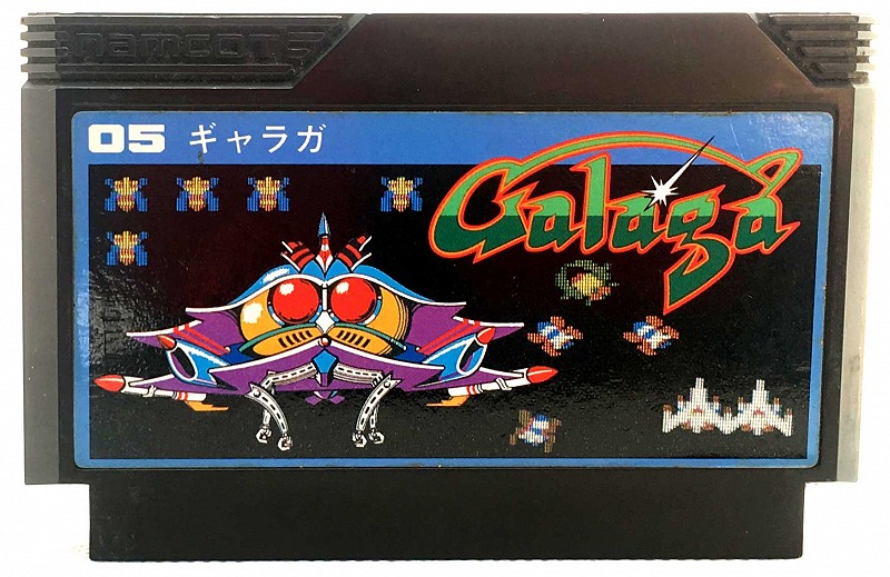 Photo of the black NAMCOT custom cartridge for Galaga for Nintendo Famicom