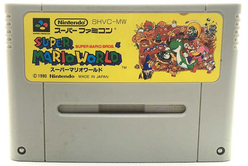 Photo of gray cartridge Super Mario World for Super Famicom